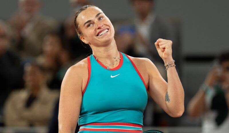 Aryna Sabalenka celebrates winning her match against Iga Swiatek.