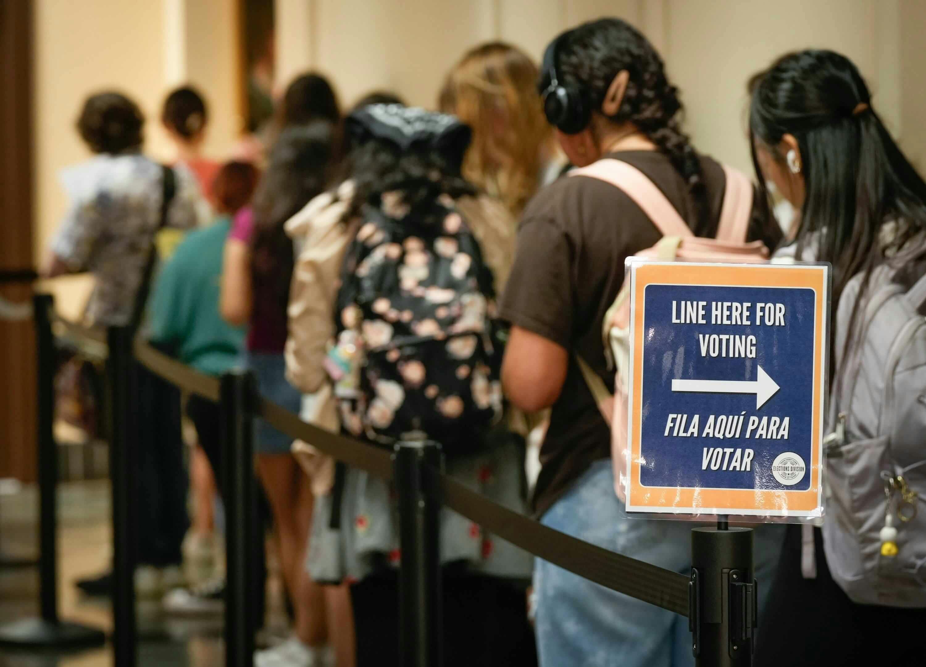 University of Texas students wait in line to cast their ballots at the UT Union Building during early voting, Wednesday October 23. (Credit: Jay Janner/American-Statesman)