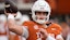  Texas Longhorns quarterback Arch Manning (16) warms up.