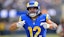 Los Angeles Rams wide receiver Puka Nacua (12) celebrates after a complete pass.