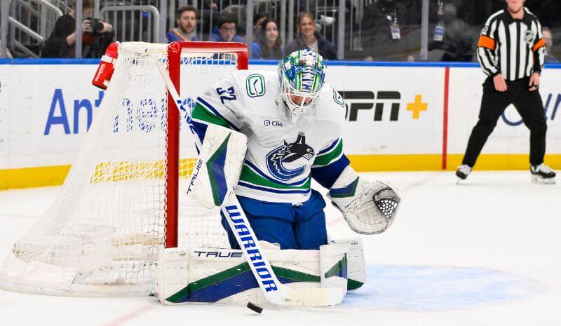 Vancouver Canucks goaltender Kevin Lankinen (32) defends the net against the St. Louis Blues.