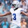 Dallas Cowboys wide receiver George Pickens (3) celebrates a touchdown during the second half against the Carolina Panthers at Bank of America Stadium.