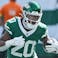 New York Jets running back Breece Hall (20) runs with the ball in the first quarter against the Carolina Panthers at MetLife Stadium.