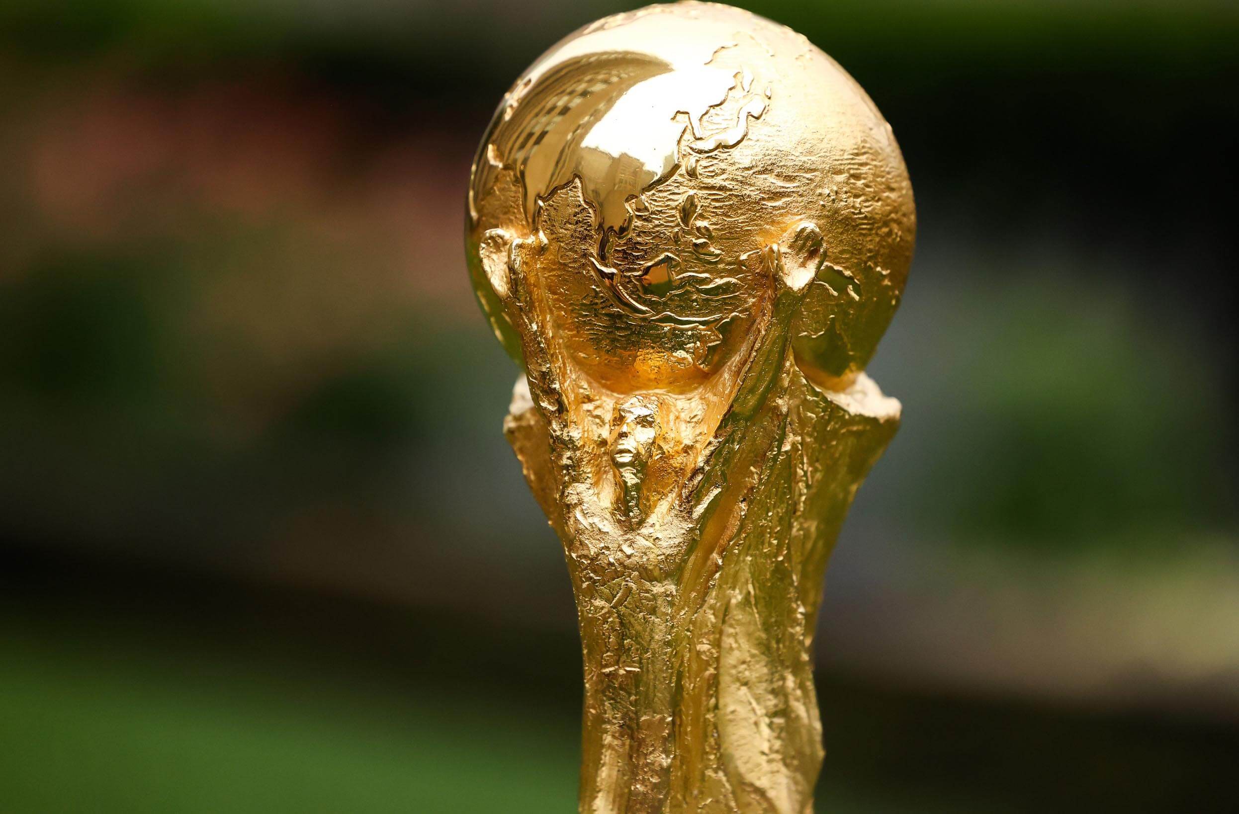 A detail view of The FIFA World Cup Trophy sits on a stand outside of 30 Rockefeller Plaza.