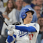 Los Angeles Dodgers two-way player Shohei Ohtani (17) hits a solo home run against the Milwaukee Brewers.