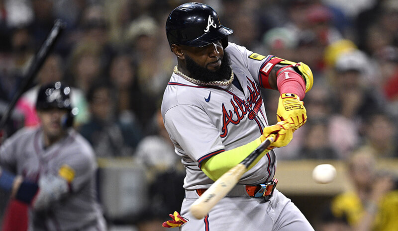 Atlanta Braves designated hitter Marcell Ozuna (20) hits a home run against the San Diego Padres during the ninth inning at Petco Park.