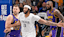 Los Angeles Lakers guard Luka Doncic (77) and forward LeBron James (23) and Dallas Mavericks forward Anthony Davis (3) in action.