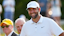 Scottie Scheffler laughs at a comment by Jack Nicklaus on hole No. 18 after the final round of the Memorial Tournament at Muirfield Village Golf Course on Sunday, June 1, 2025 in Dublin, Ohio.