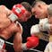 Danny Garcia (red trunks) and Brandon Rios (white trunks) box during a boxing match at Mandalay Bay Events Center. Garcia won via ninth round TKO.