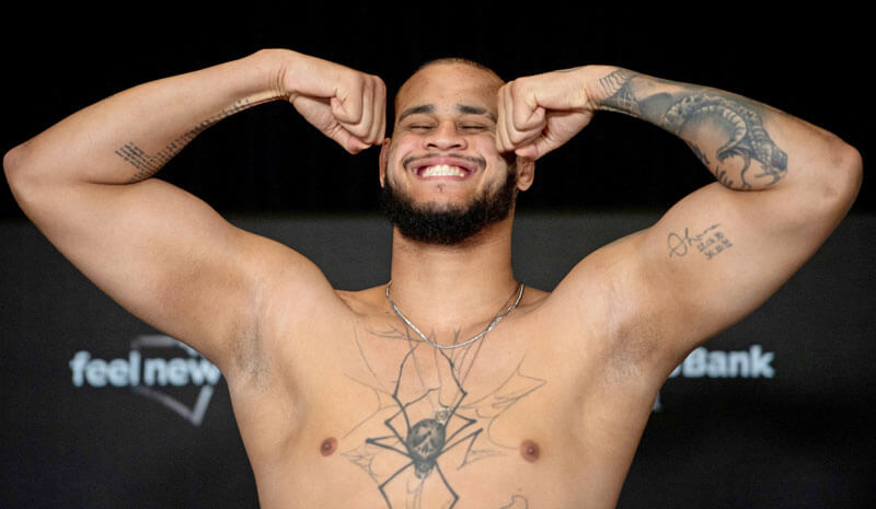 Tallison Teixeira poses during the UFC 325 weigh-ins.