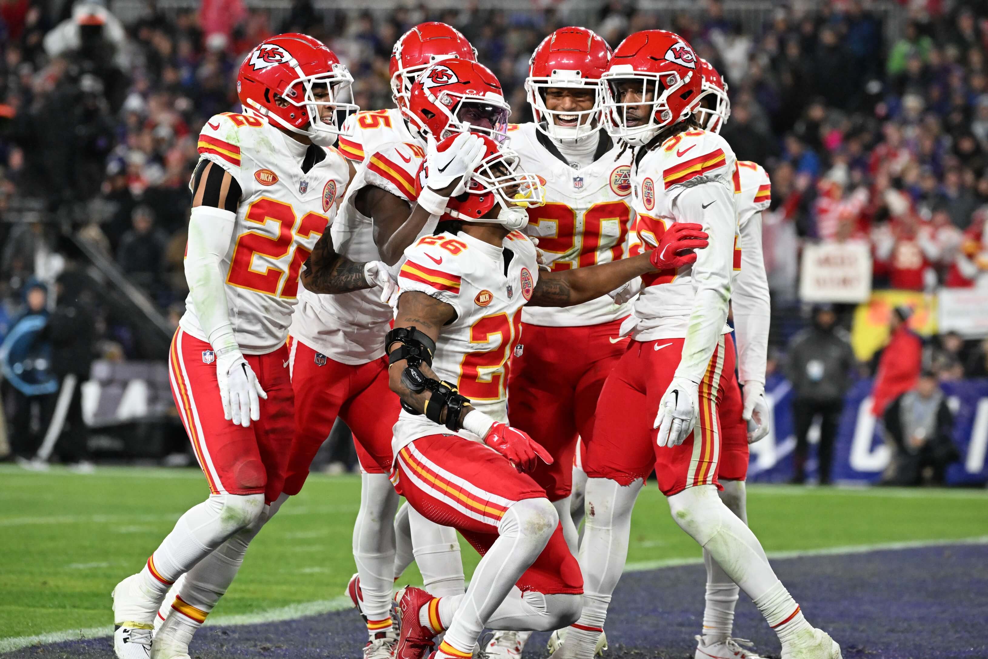 Kansas City Chiefs safety Deon Bush (26) celebrates with teammates after intercepting a pass in the end zone in the second half against the Baltimore Ravens in the AFC Championship football game at M&T Bank Stadium.
