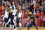 Washington Commanders wide receiver Noah Brown (85) prepares to catch a game-winnning Hail Mary pass on the final play of the game against the Chicago Bears at Northwest Stadium. Mandatory Credit: Geoff Burke-Imagn Images