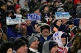 New England Patriots fans hold up Patriots license plates during the second half of the AFC divisional playoff round against the Houston Texans at Gillette Stadium, in Foxborough, Massachusetts. Eric Canha/CSM/Sipa USA