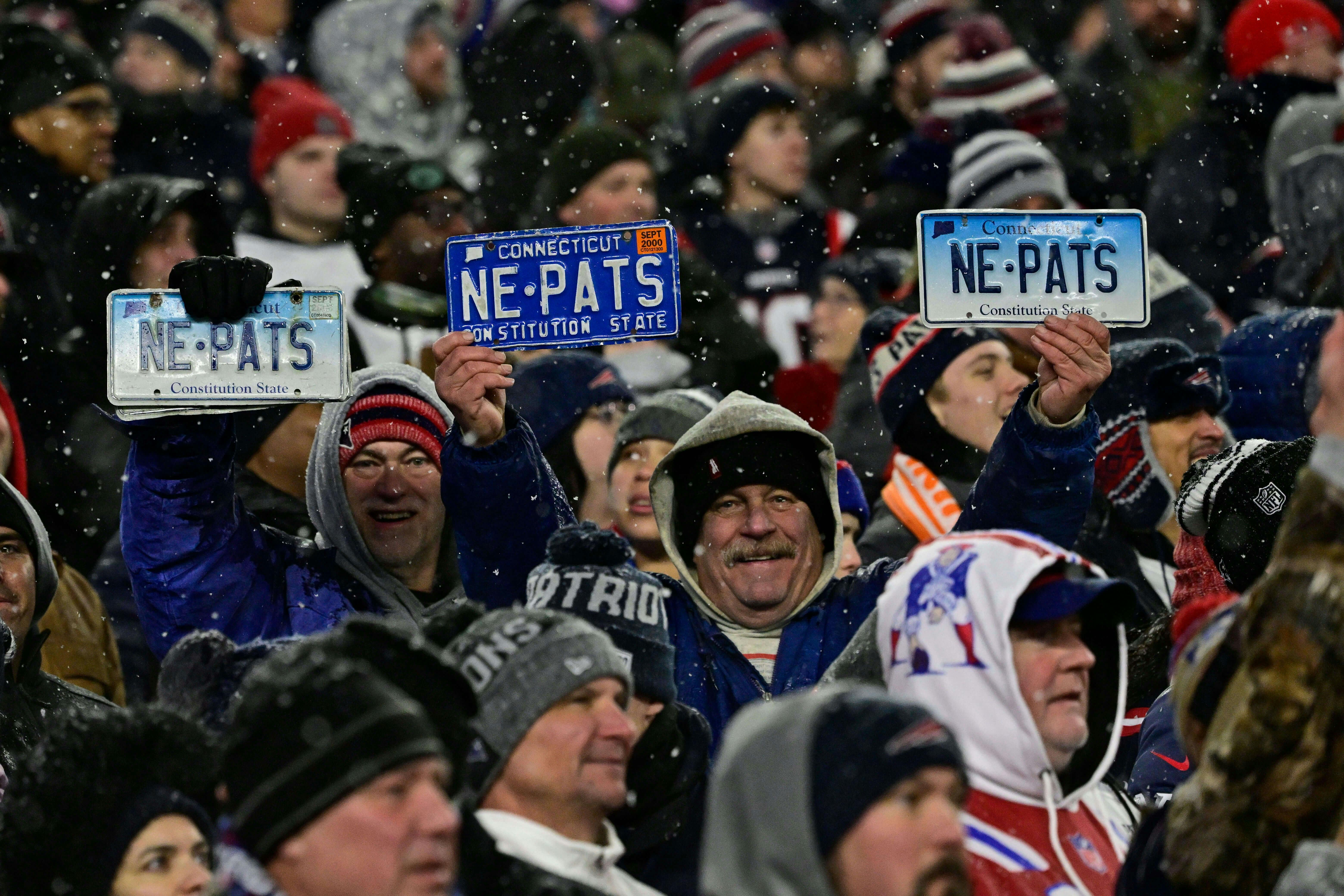 New England Patriots fans hold up Patriots license plates during the second half of the AFC divisional playoff round against the Houston Texans at Gillette Stadium, in Foxborough, Massachusetts. Eric Canha/CSM/Sipa USA