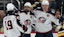 Columbus Blue Jackets left wing Dmitri Voronkov (right) celebrates his second goal of the game with center Adam Fantilli (19) and right-wing Kirill Marchenko (86)