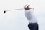 Shane Lowry tees off on the third hole during the third round of the Travelers Championship golf tournament at TPC River Highlands.