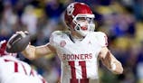 Oklahoma Sooners quarterback Jackson Arnold (11) passes against the LSU Tigers.