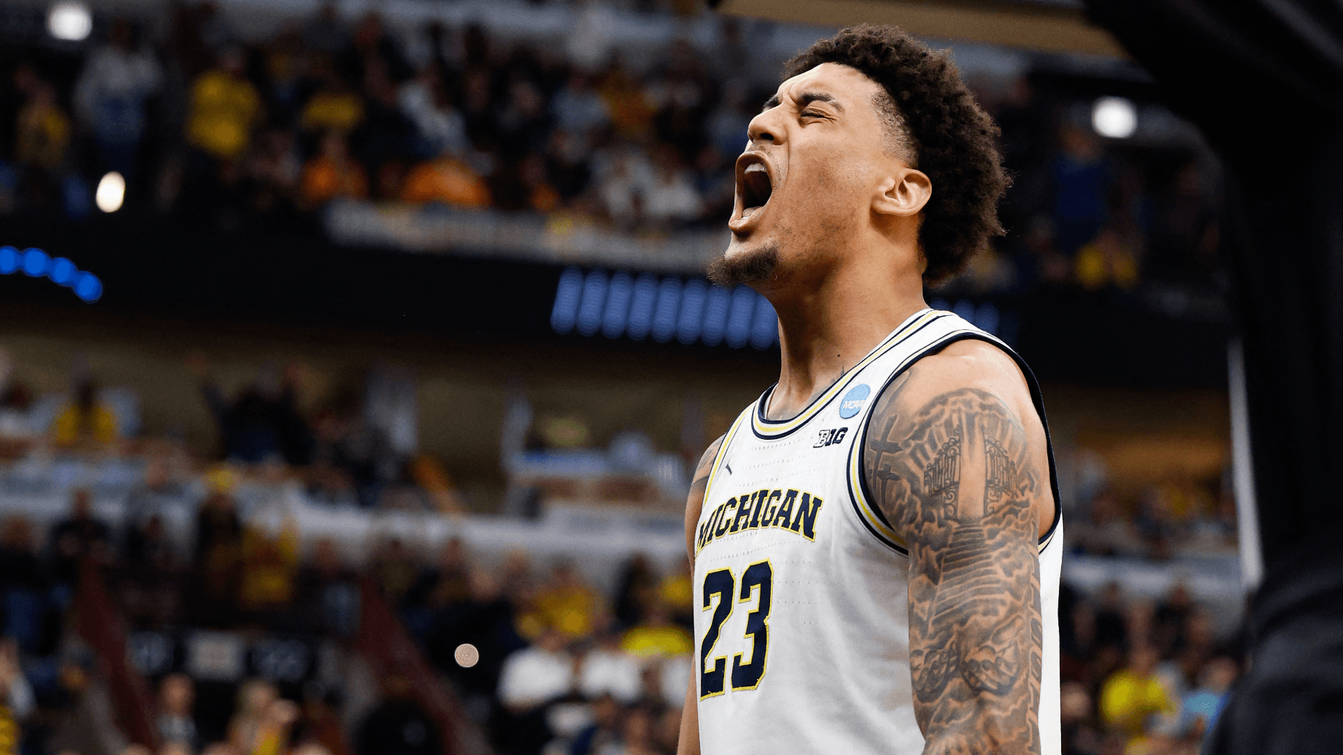 Michigan Wolverines forward Yaxel Lendeborg (23) reacts in the second half against the Tennessee Volunteers during an Elite Eight game of the Midwest Regional of the men's 2026 NCAA Tournament at United Center.