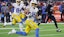 Los Angeles Chargers wide receiver Ladd McConkey (15) scores on a pass.