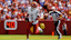 Washington Commanders quarterback Jayden Daniels (5) runs the ball against the New York Giants.