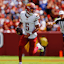 Washington Commanders quarterback Jayden Daniels (5) runs the ball against the New York Giants.