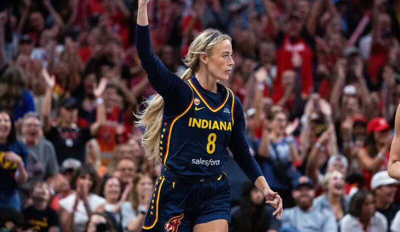 Indiana Fever guard Sophie Cunningham (8) celebrates a made basket.