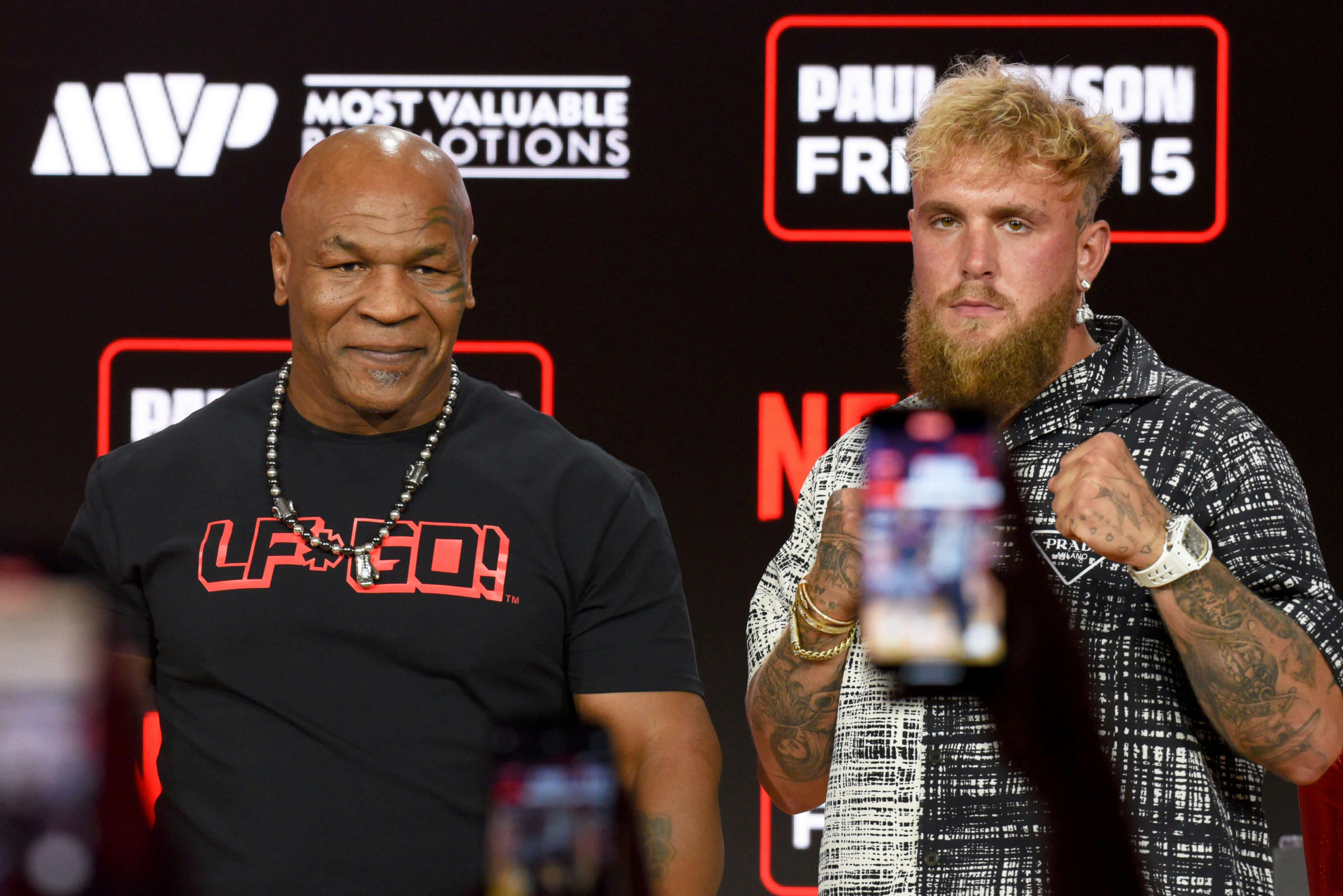 Mike Tyson and Jake Paul face off at boxing fight press conference at Fanatics Fest NYC 2024 at Javits Center in New York, NY on August 18, 2024. (Photo by Efren Landaos/ Sipa USA)