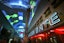 The historic Golden Gate Hotel and Casino (right) dates from 1906, while the Fremont Street Experince hovering above it is an addition to downtown from the 1990s. (Photo by cdm) 2005