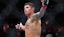 Daniel Zellhuber (red gloves) reacts after defeating Christos Giagos.