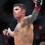 Daniel Zellhuber (red gloves) reacts after defeating Christos Giagos.