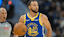 Golden State Warriors guard Stephen Curry (30) dribbles against the Phoenix Suns in the fourth quarter at Chase Center.