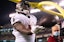 Buccaneers running back Leonard Fournette (7) tosses the ball into the stands after scoring a touchdown Philadelphia Eagles during the third quarter at Lincoln Financial Field.