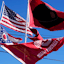 Ohio State flags fly outside Mercedes-Benz Stadium prior to the College Football Playoff National Championship against the Notre Dame Fighting Irish in Atlanta on Jan. 20, 2025.