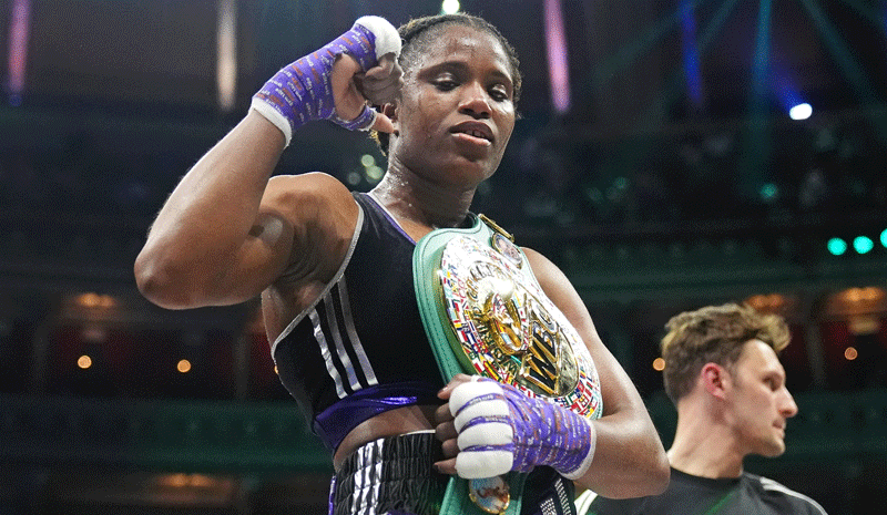 Caroline Dubois celebrates victory against Bo Mi Re Shin (not pictured) following the WBC World Light weight bout at the Royal Albert Hall.