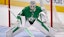 Dallas Stars goaltender Jake Oettinger (29) faces the Winnipeg Jets attack.