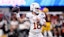 Longhorns quarterback Arch Manning (16) warms up before the Peach Bowl.