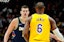 Los Angeles Lakers forward LeBron James and Denver Nuggets center Nikola Jokic in NBA action.