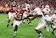 Alabama Crimson Tide quarterback Ty Simpson (15) is forced out of bounds by Tennessee Volunteers linebacker Arion Carter (7) in he fourth quarter at Saban Field at Bryant-Denny Stadium. David Leong-Imagn Images