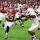 Alabama Crimson Tide quarterback Ty Simpson (15) is forced out of bounds by Tennessee Volunteers linebacker Arion Carter (7) in he fourth quarter at Saban Field at Bryant-Denny Stadium. David Leong-Imagn Images
