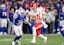 Kansas City Chiefs quarterback Patrick Mahomes (15) runs the ball as Buffalo Bills cornerback Cam Lewis (39) tries to punch the ball loose in the fourth quarter at Highmark Stadium. Mandatory Credit: Mark Konezny-Imagn Images