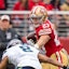 San Francisco 49ers running back Christian McCaffrey (23) runs against Seattle Seahawks cornerback Coby Bryant (8) during the second quarter at Levi's Stadium. Kyle Terada-Imagn Images