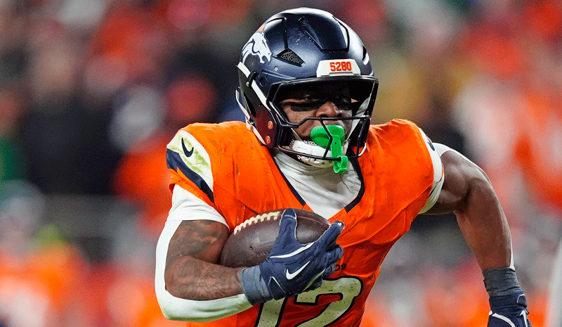 Denver Broncos running back RJ Harvey (12) runs for a gain during the fourth quarter against the Green Bay Packers at Empower Field at Mile High.