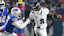 Baltimore Ravens quarterback Lamar Jackson (8) runs the ball against Buffalo Bills cornerback Taron Johnson (7).