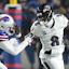 Baltimore Ravens quarterback Lamar Jackson (8) runs the ball against Buffalo Bills cornerback Taron Johnson (7).
