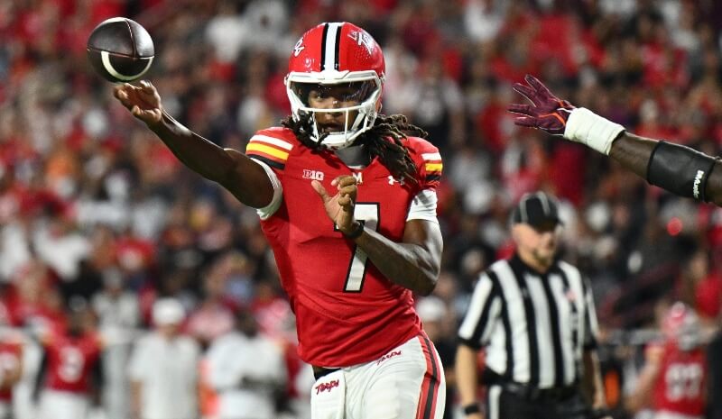 Maryland Terrapins quarterback Malik Washington (7) passes the football.