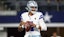 Dallas Cowboys quarterback Dak Prescott (4) warms up.