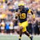 Michigan quarterback Bryce Underwood (19) runs against Central Michigan.