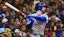 Chicago Cubs right fielder Kyle Tucker (30) drives in a run with a base hit.