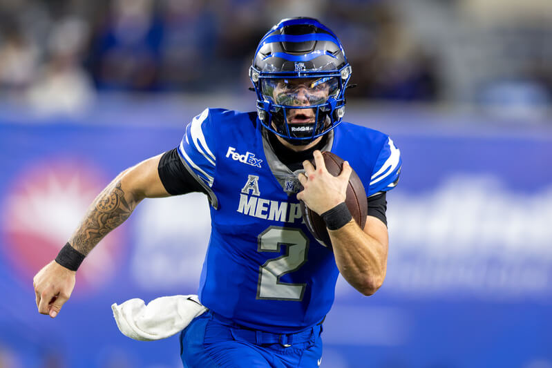 Friday Night Football Best Bets. Memphis quarterback Marcus Stokes (2) runs with the ball.
