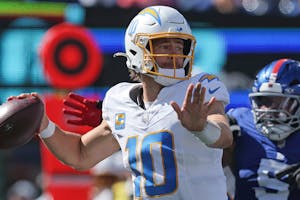 Justin Herbert Odds, Picks & Same-Game Parlay for Commanders vs Chargers